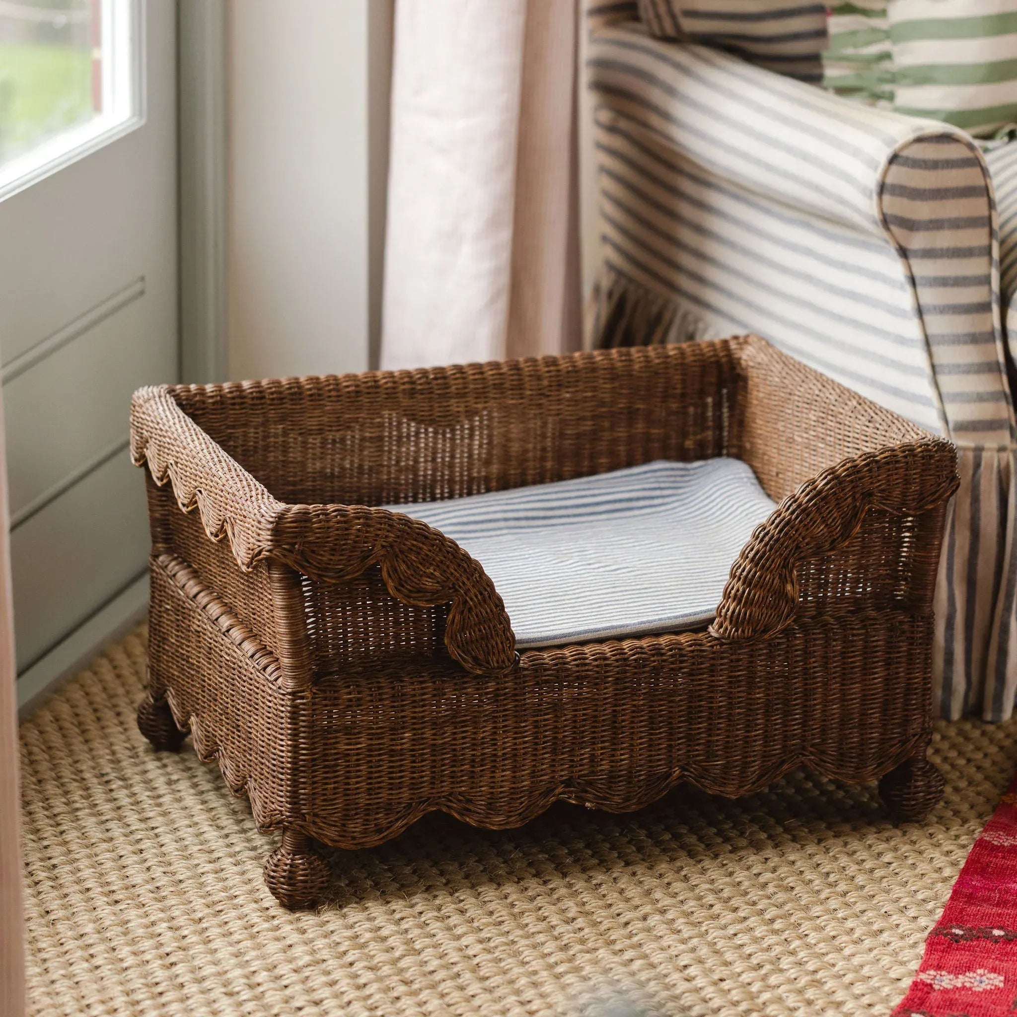 Image showcasing Ziggy Scalloped Rattan Dog Bed | Maison Flâneur