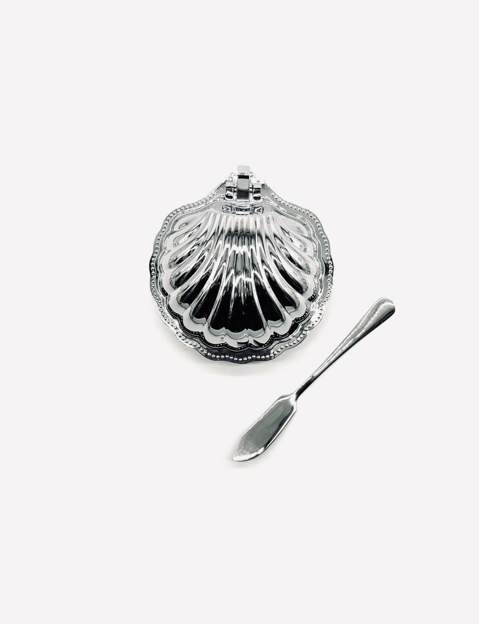 A Shell Butter Dish in Stainless Steel