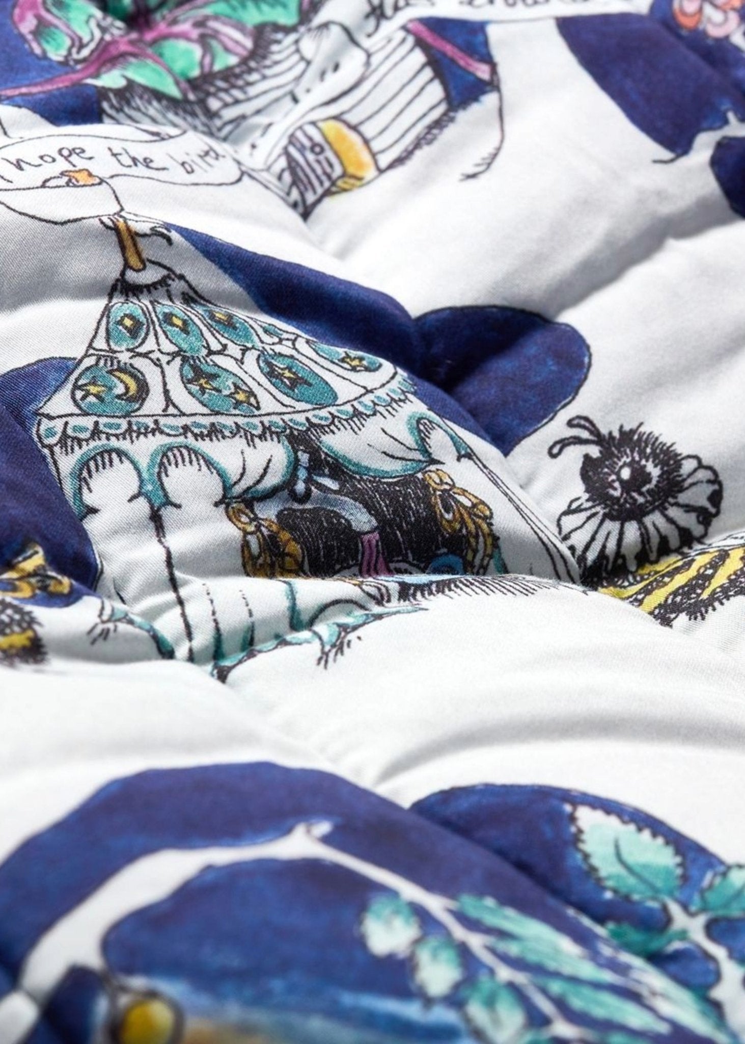 The Space Above the Ground Quilted Blanket