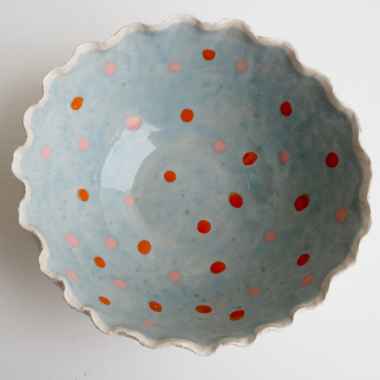 Handmade Blue & White Textural Ceramic Fruit Bowl with orange & pink polka dots
