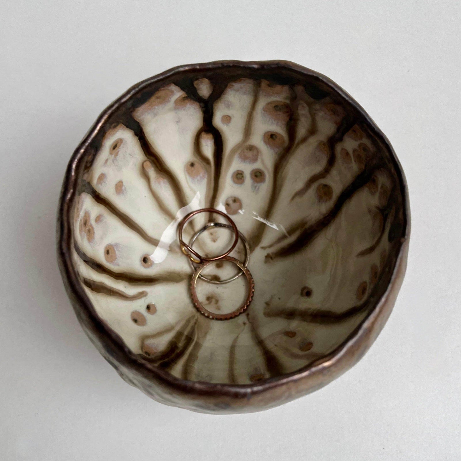 Handmade Gold Ceramic Ring Bowl with Swirly Dripped Glaze