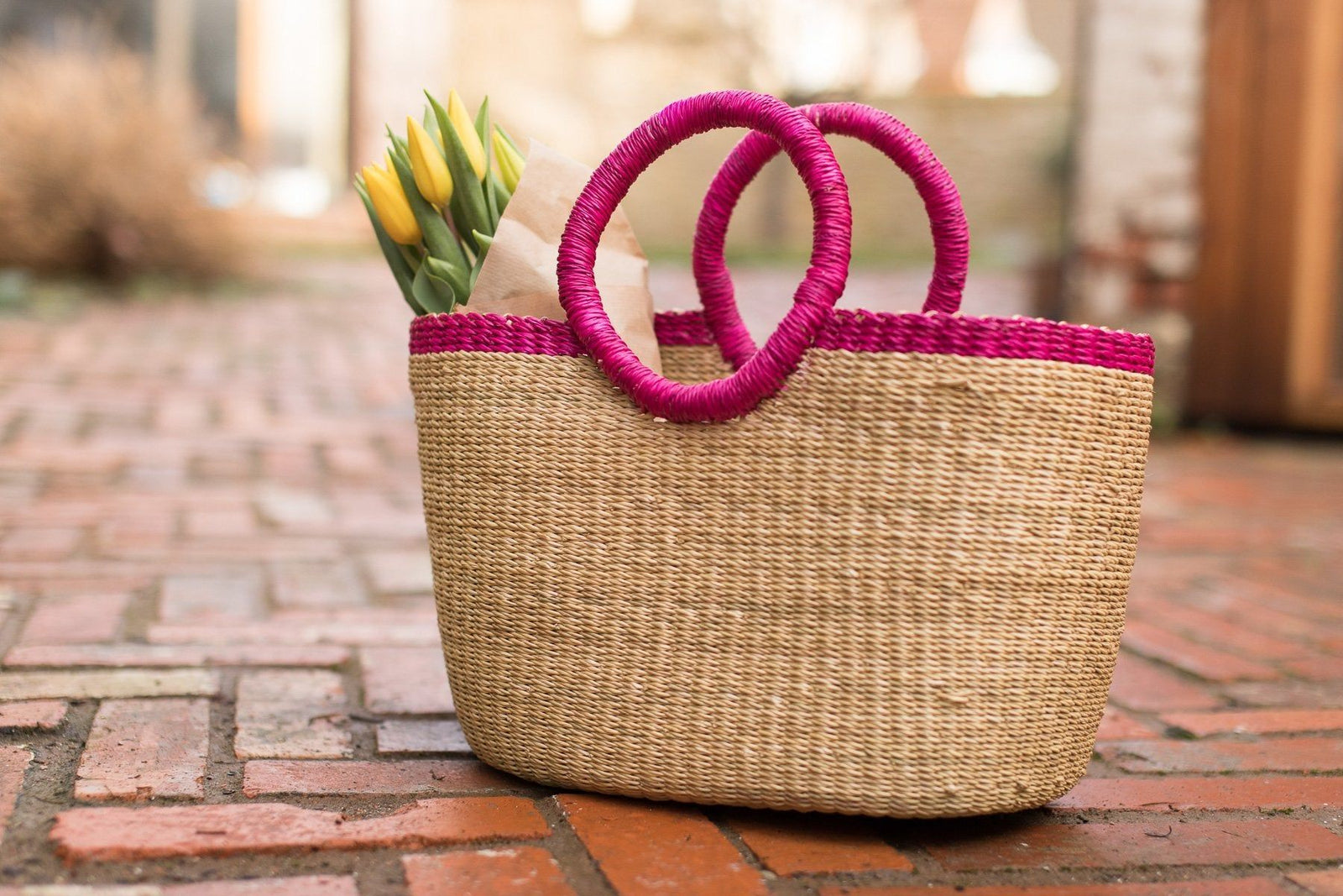 KANN: Oval Pink Rim Bolga Shopping Basket