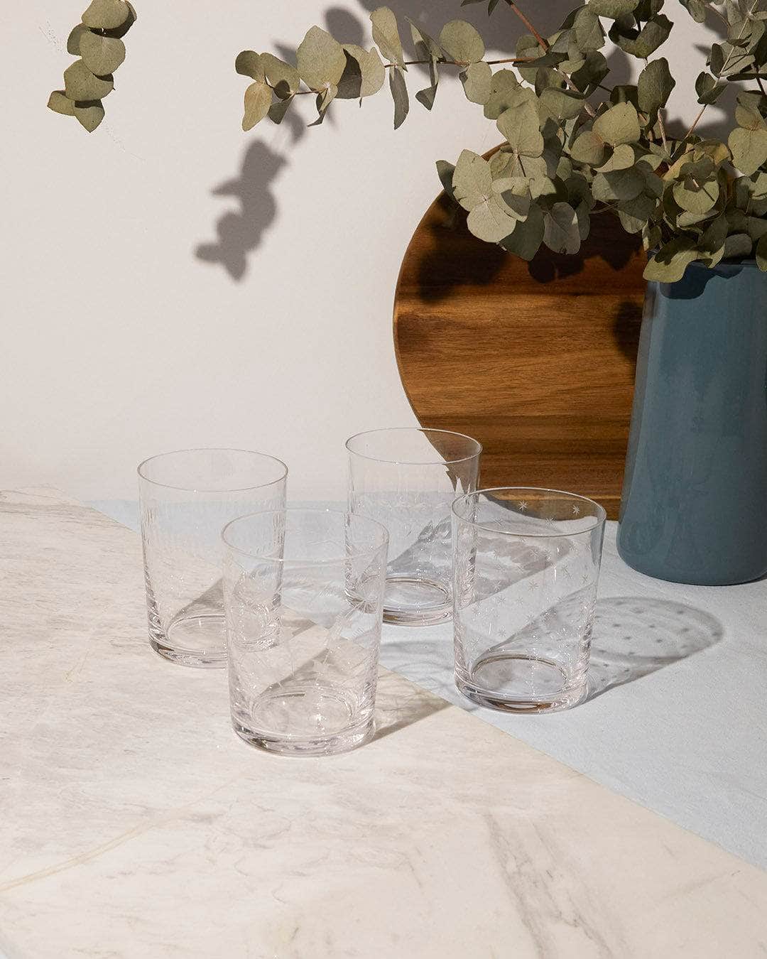 A Set of Four Crystal Large Tumblers with Ovals Design