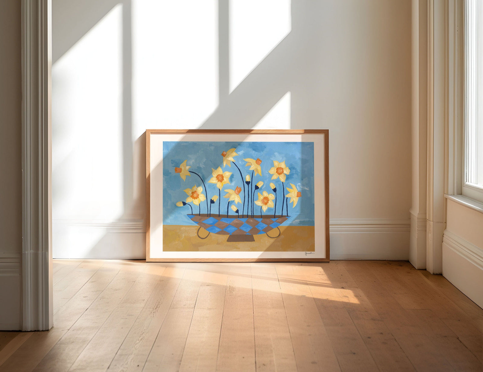 daffodils in checkered vase