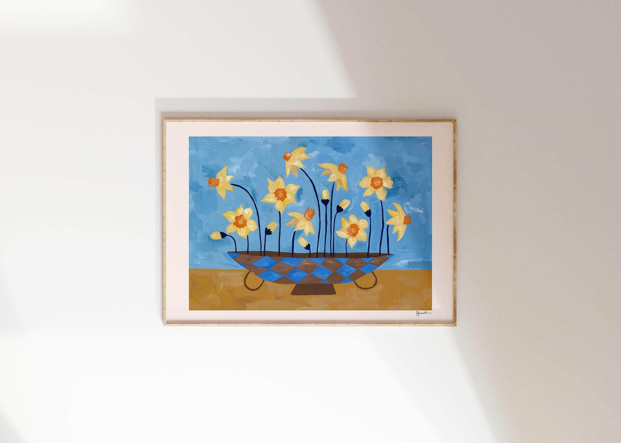 daffodils in checkered vase