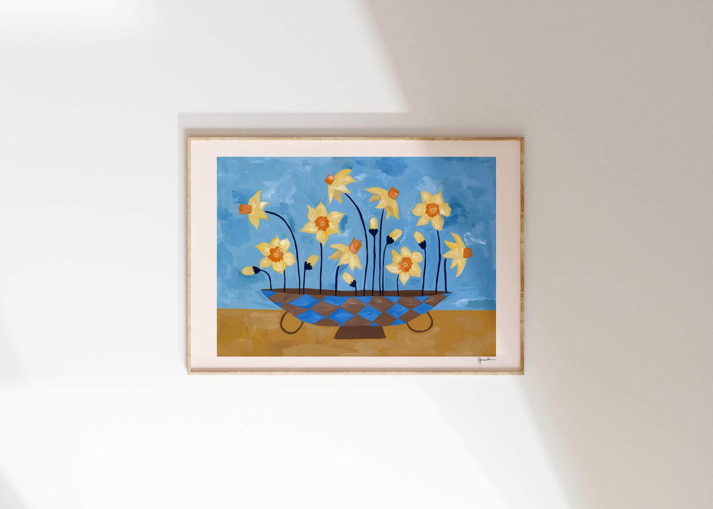daffodils in checkered vase