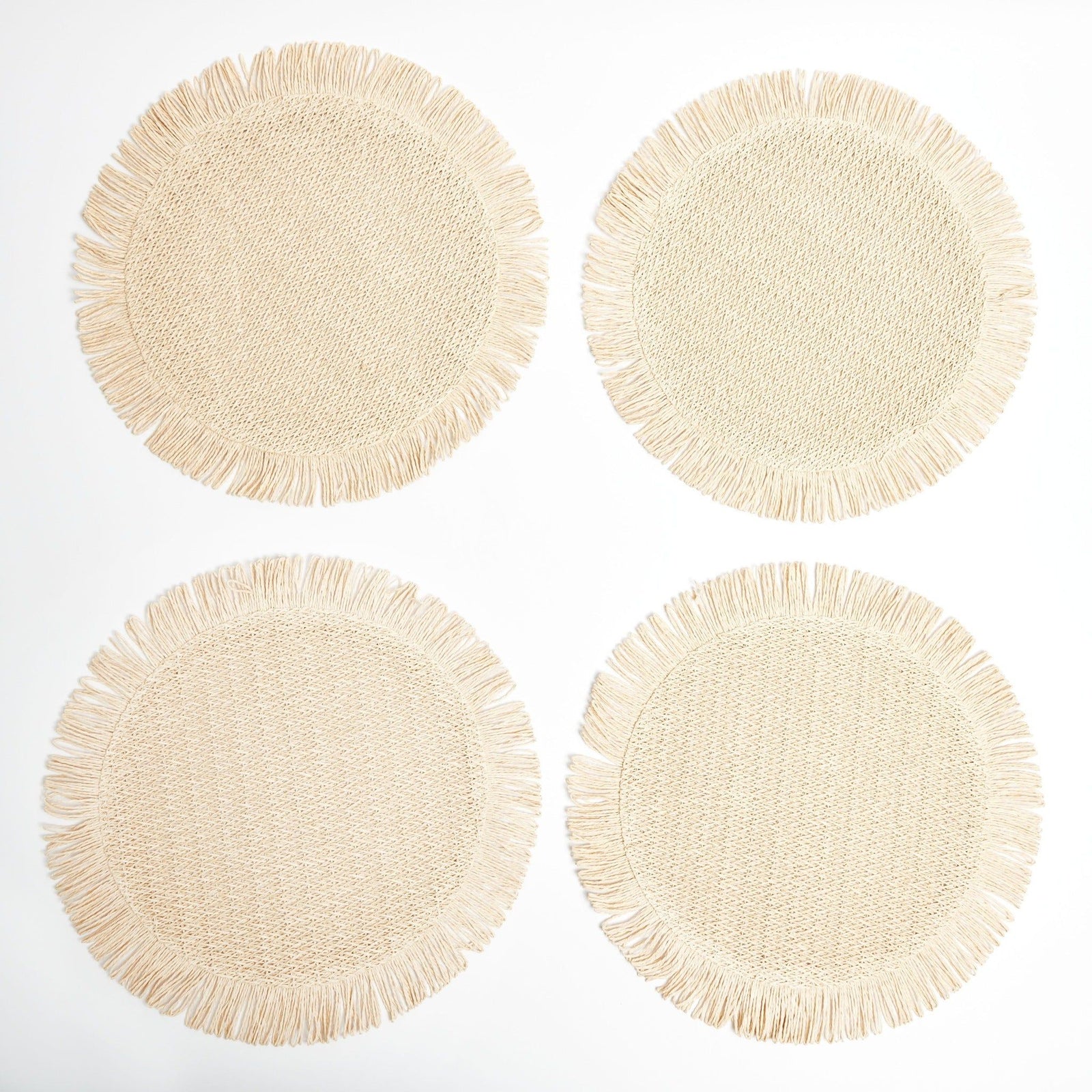 Elia Woven Rattan Round Fringed Placemats (set of 4)