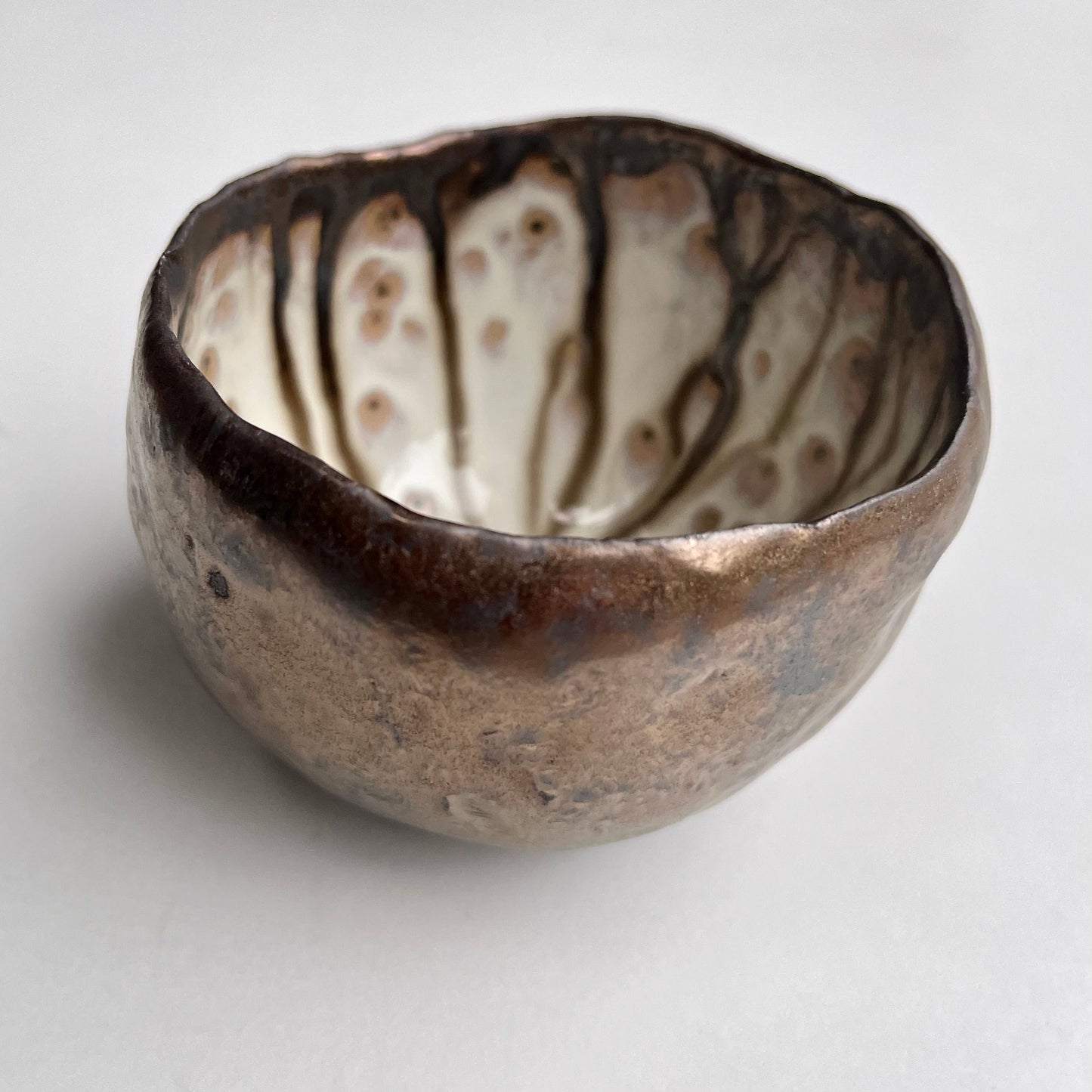 Handmade Gold Ceramic Ring Bowl with Swirly Dripped Glaze