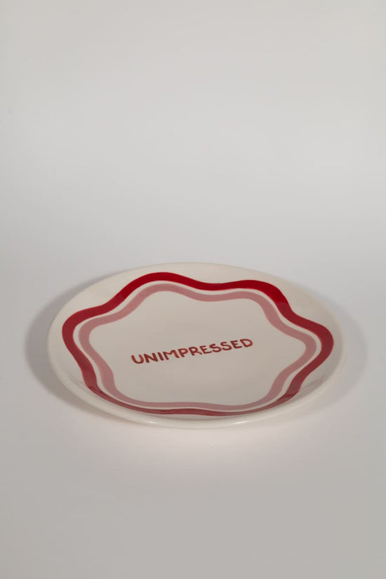 Unimpressed Dinner Plate
