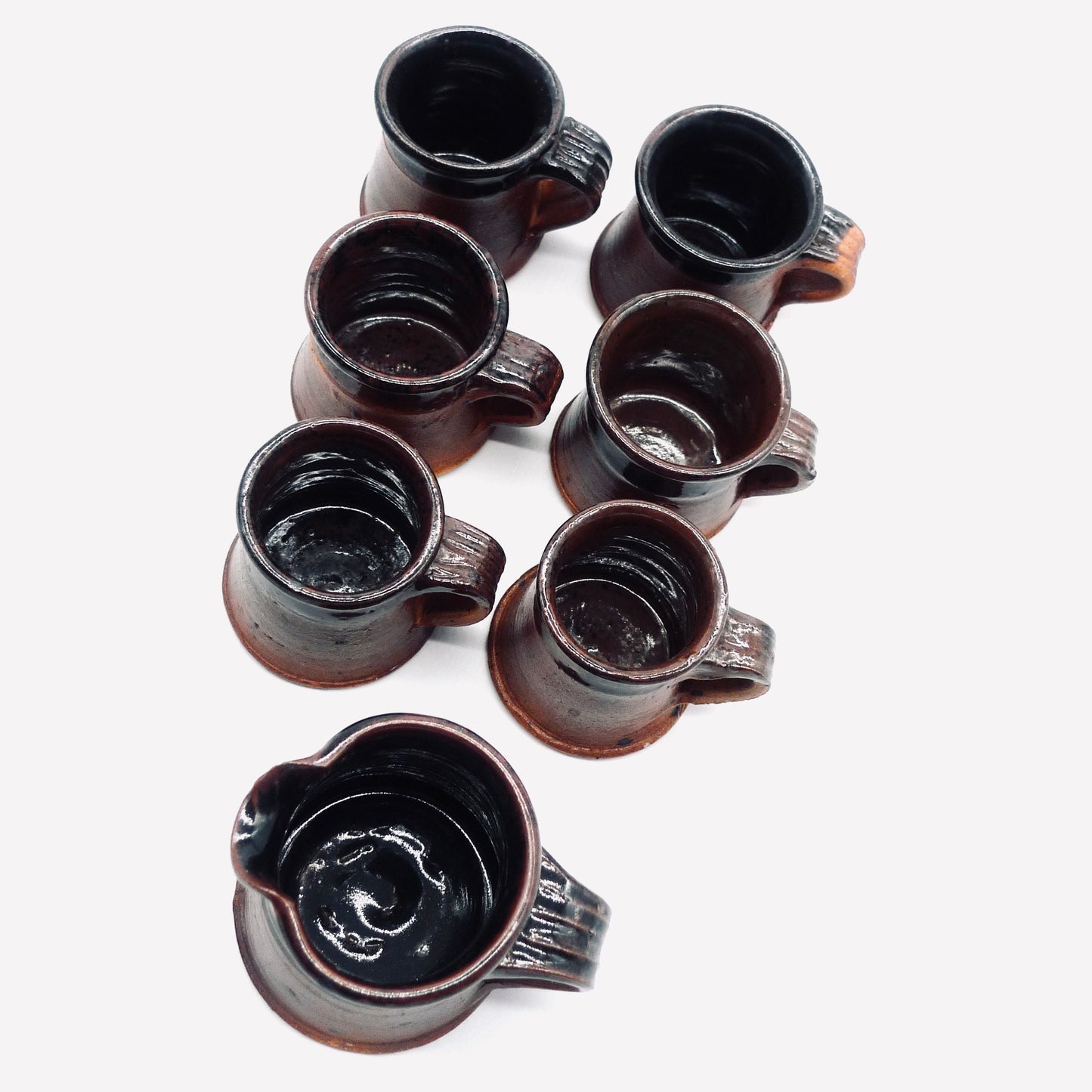 Six Cups and Milk Jug