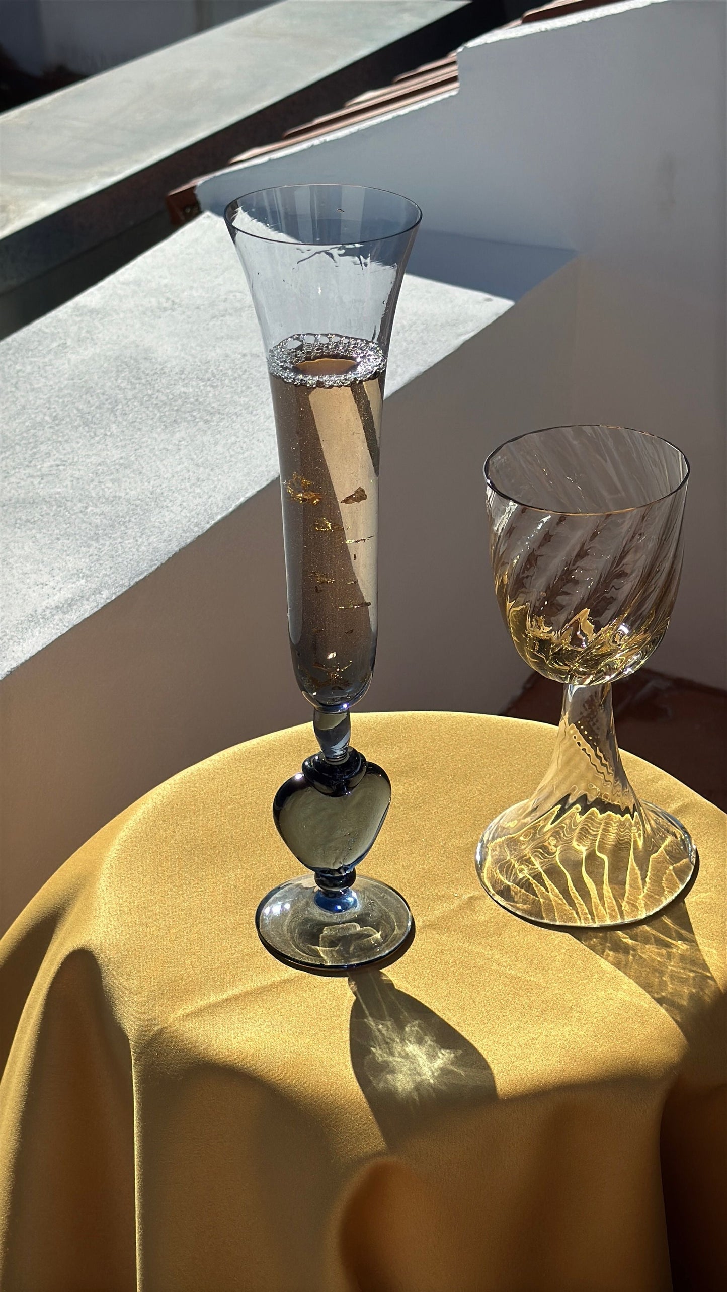 A Pair of Hand Blown Champagne Flutes with Heart