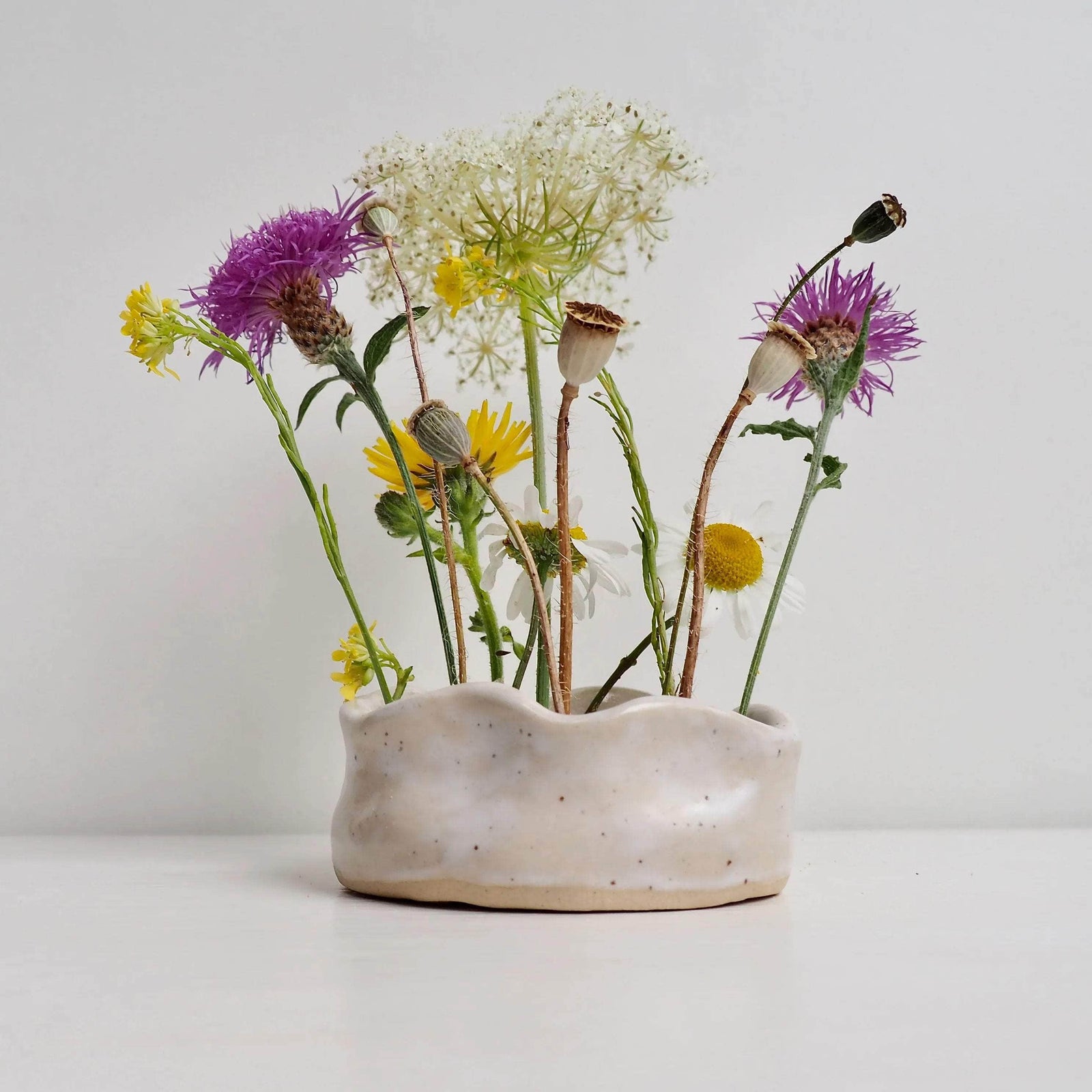 Large White Speckled Curvy Ceramic Flower Frog