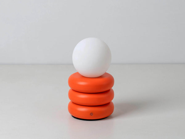 Peel orange cordless table lamp