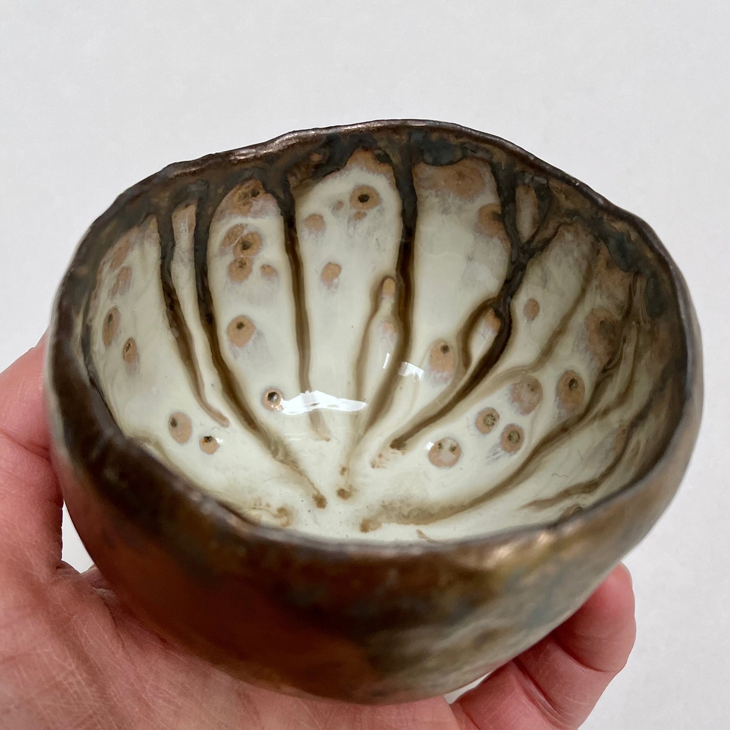 Handmade Gold Ceramic Ring Bowl with Swirly Dripped Glaze