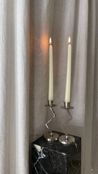 A Pair of Chrome Memphis Zig Zag Candlesticks