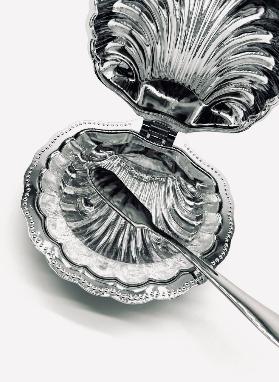 A Shell Butter Dish in Stainless Steel