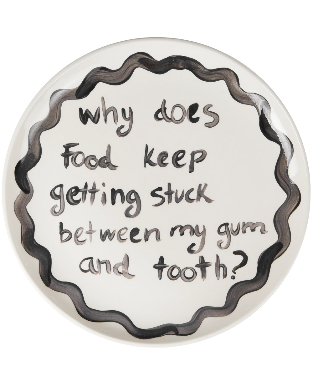 "Why Does Food Keep Getting Stuck Between My Gum and tooth" Plate