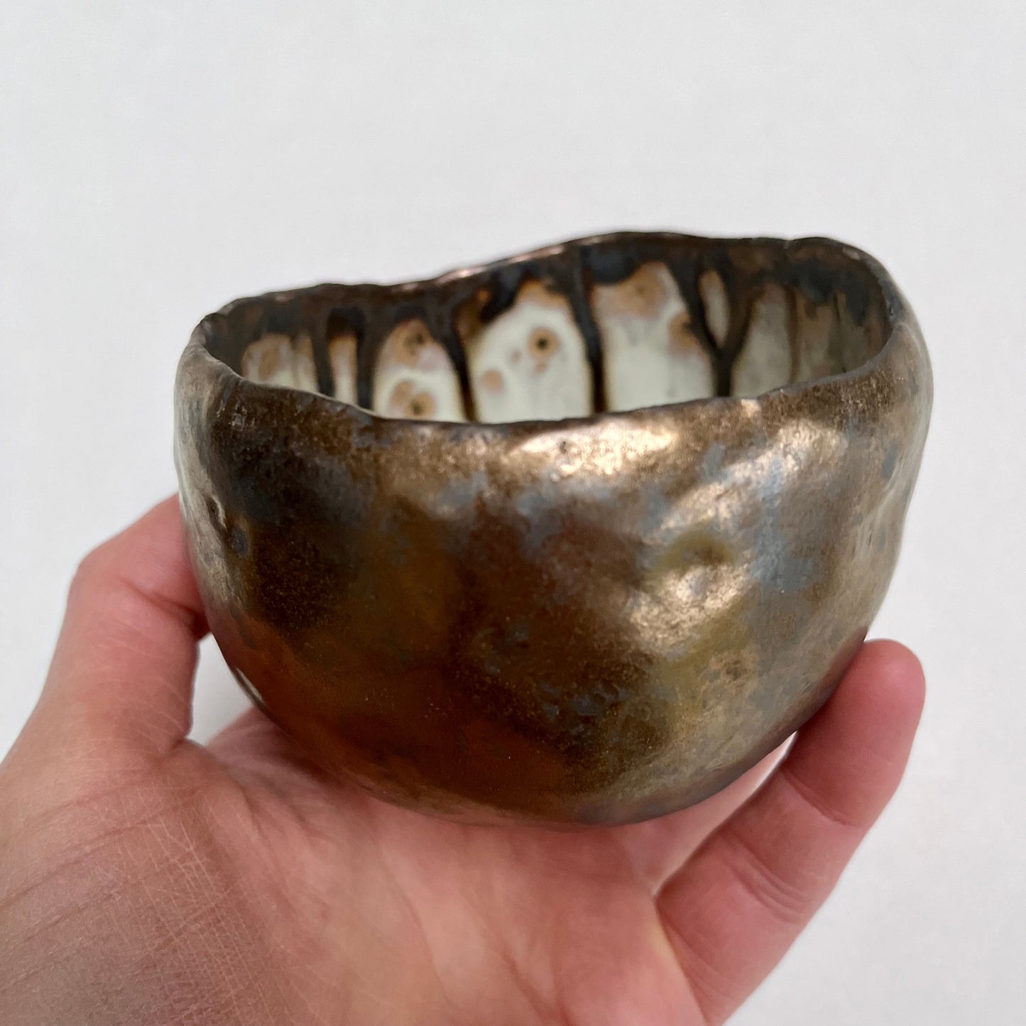 Handmade Gold Ceramic Ring Bowl with Swirly Dripped Glaze