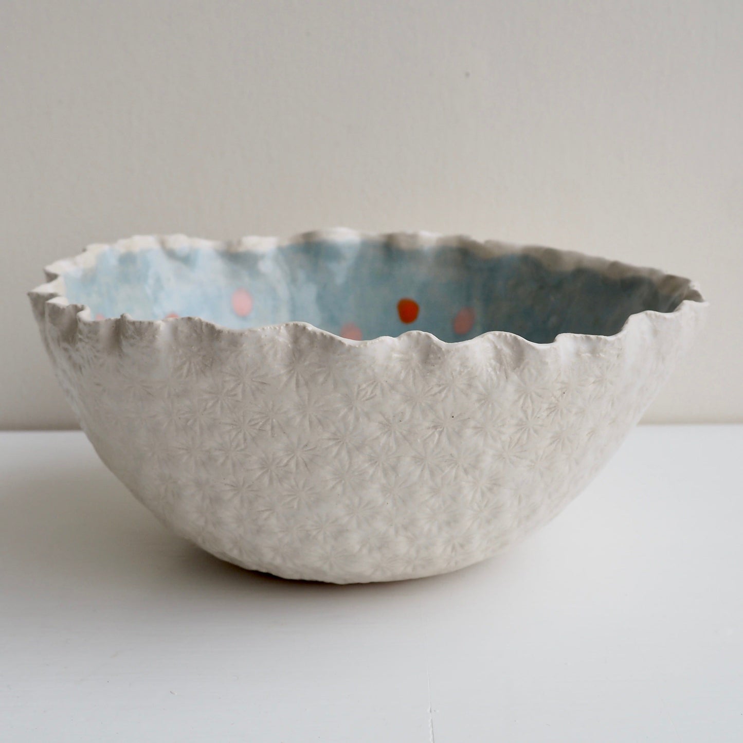 Handmade Blue & White Textural Ceramic Fruit Bowl with orange & pink polka dots