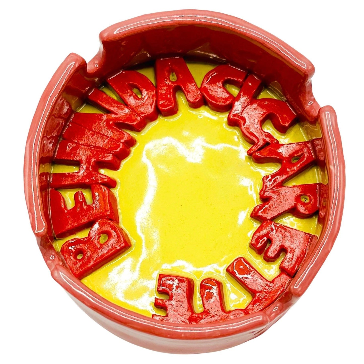 Behind A Cigarette Ashtray