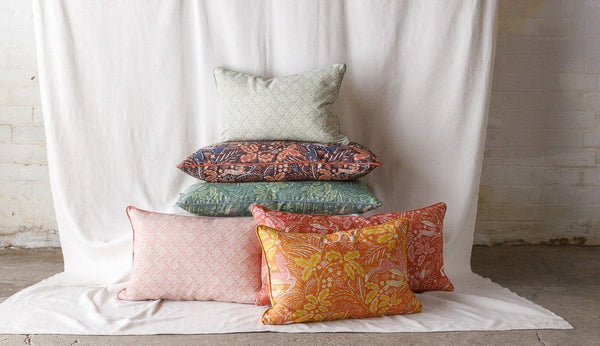 Staffordshire Bolster Cushion in Rust and Stafford Pink