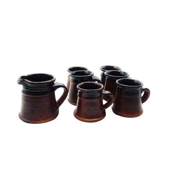Six Cups and Milk Jug