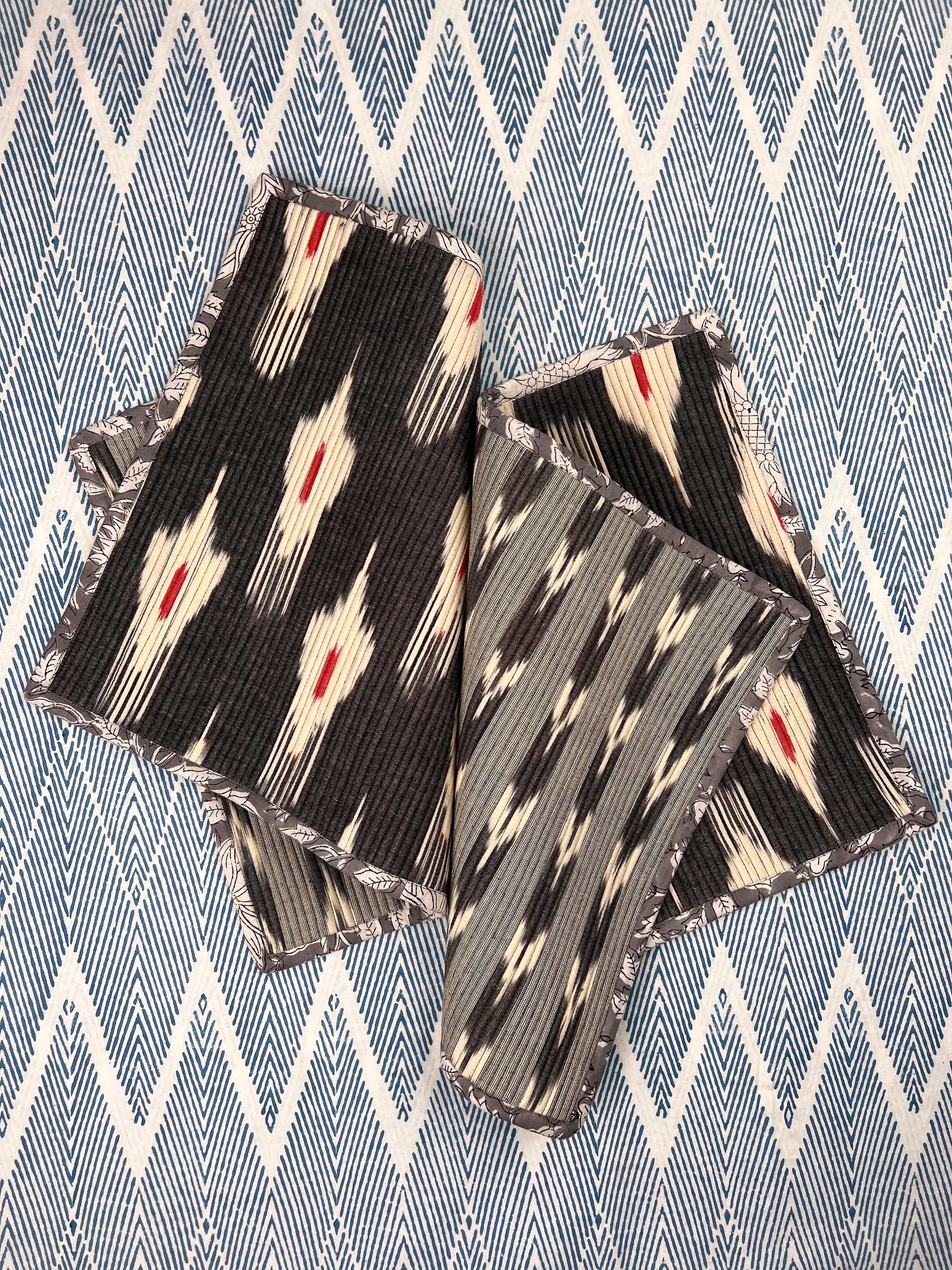 The Breakfast Ikat Placemat (pair) - Dark Grey & Ivory