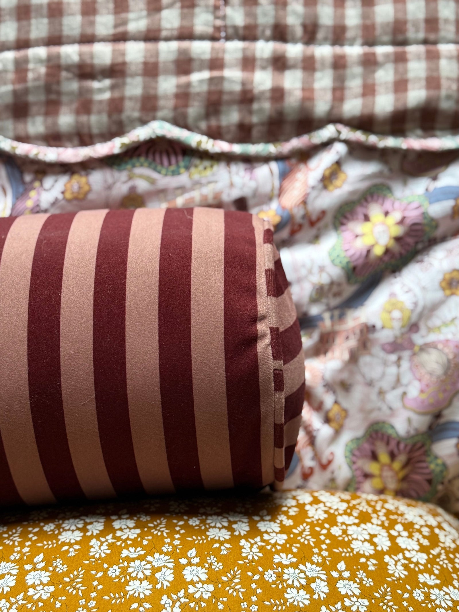 Velvet Bolster Cushion in Bougie