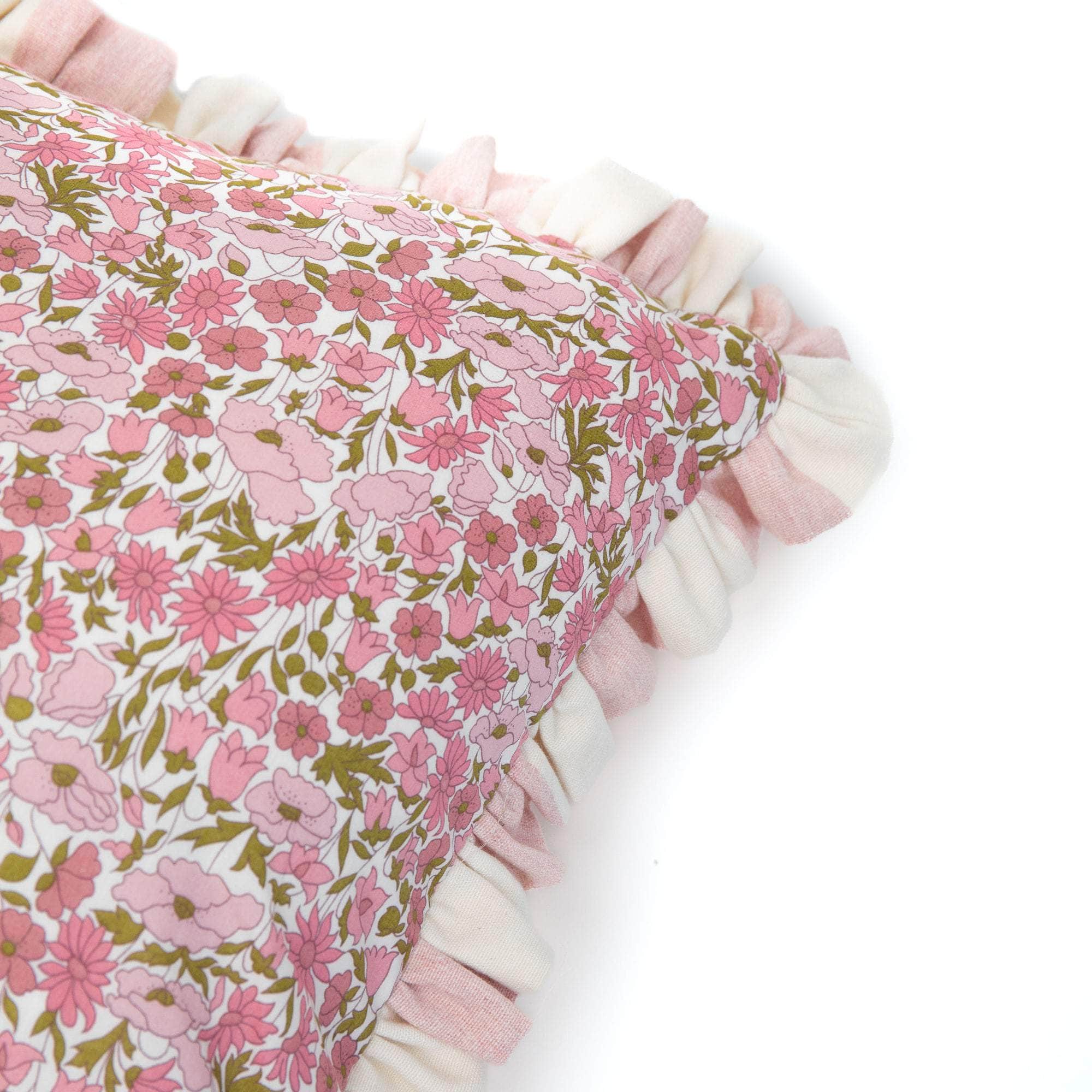 Cushion made from Liberty fabric 'Poppy and Daisy Pink'