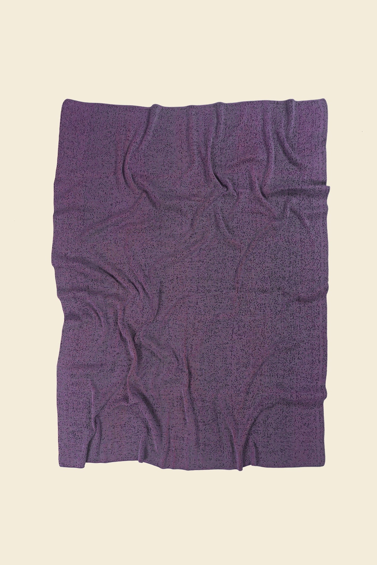 back side of red/purple knit blanket in merino wool and organic cotton