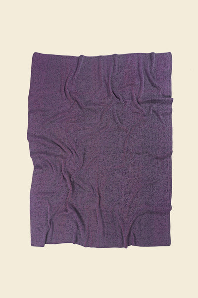 back side of red/purple knit blanket in merino wool and organic cotton
