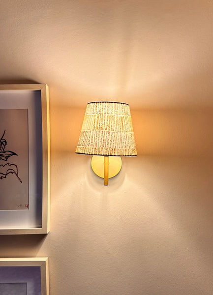Striped lampshade glowing with warm light, bold lampshade design showcasing colourful striped lighting.