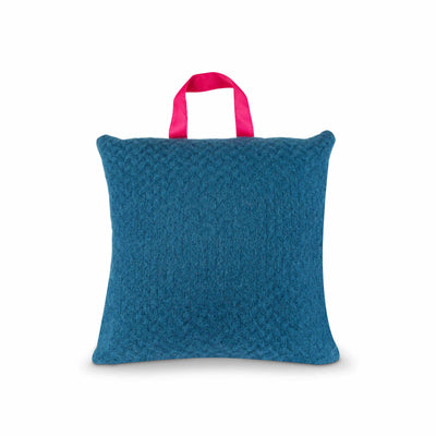 product shot of blue picnic cushion with pink waterproof backing and handle