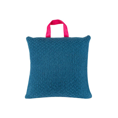 product shot of blue picnic cushion with pink waterproof backing and handle