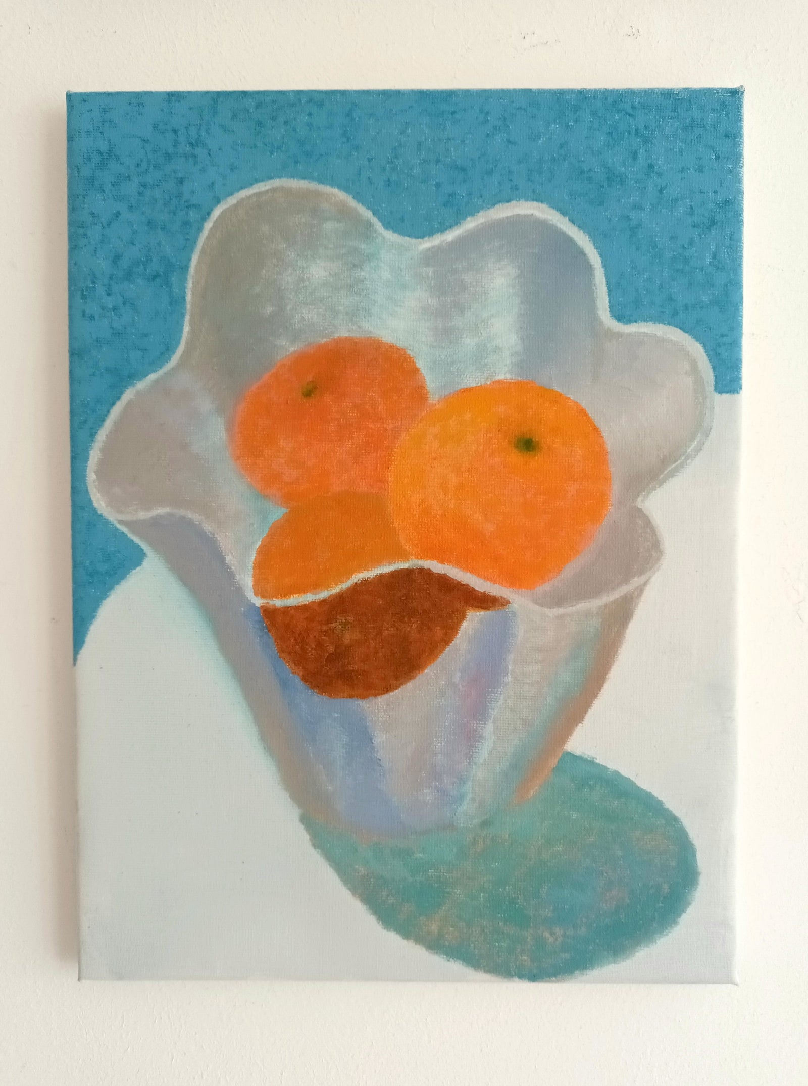 Oil painting of oranges in a glass bowl