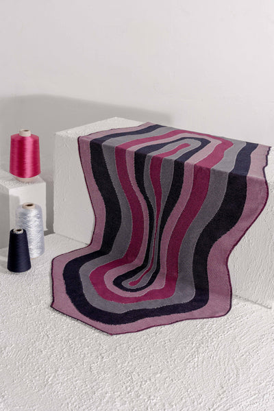 organic cotton knit tablecloth with curved edges in purple and navy on white display
