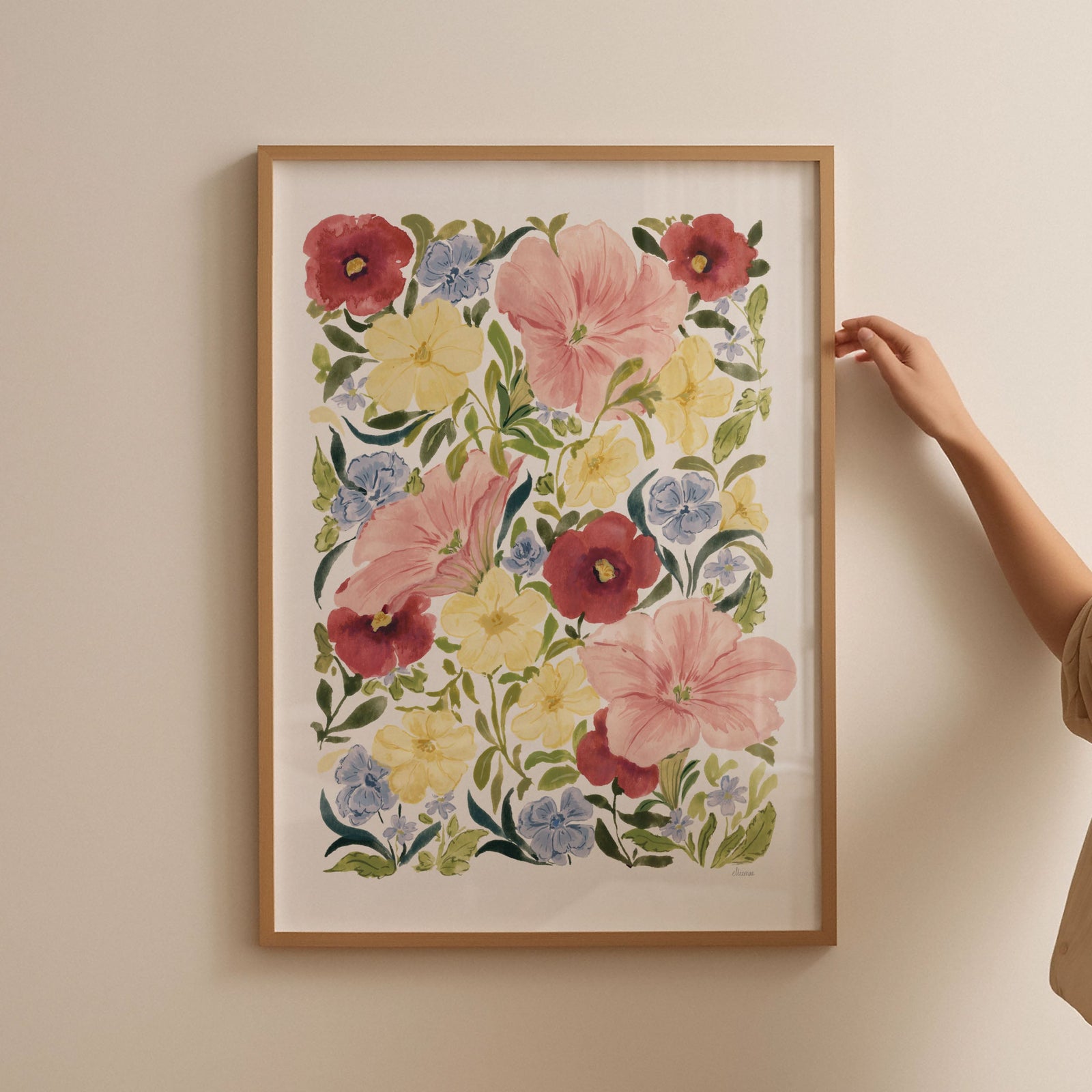 petunia blooms art print styled in thin oak frame against blank wall