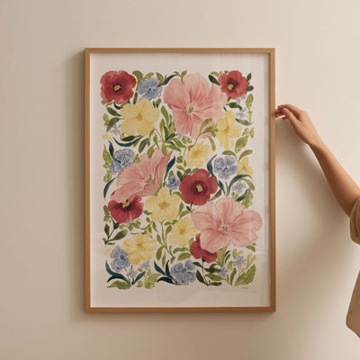 petunia blooms art print styled in thin oak frame against blank wall