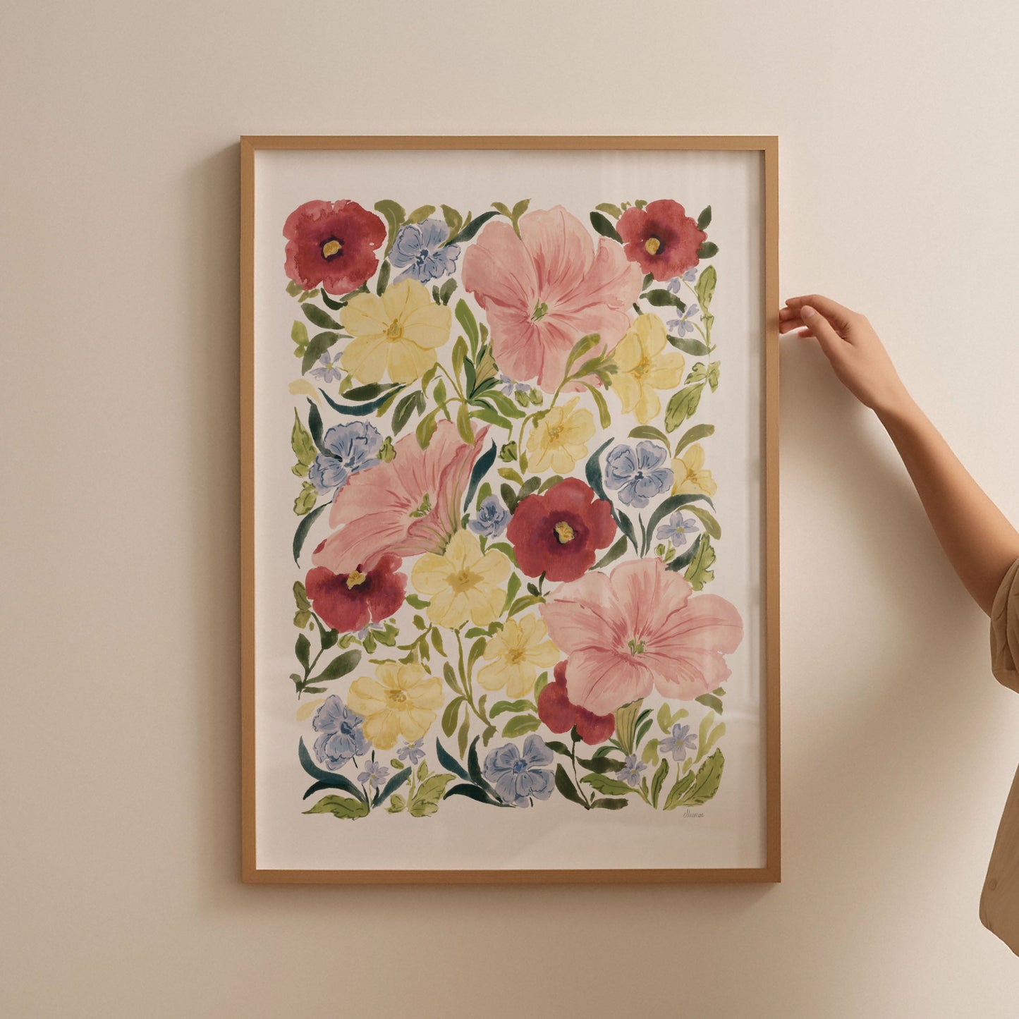 petunia blooms art print styled in thin oak frame against blank wall