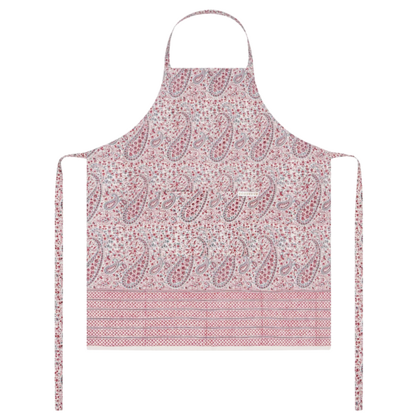 Pink paisley patterned block printed apron on a white background