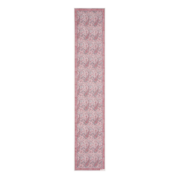 Long narrow block printed paisley design pink and white patterned table runner on a white background