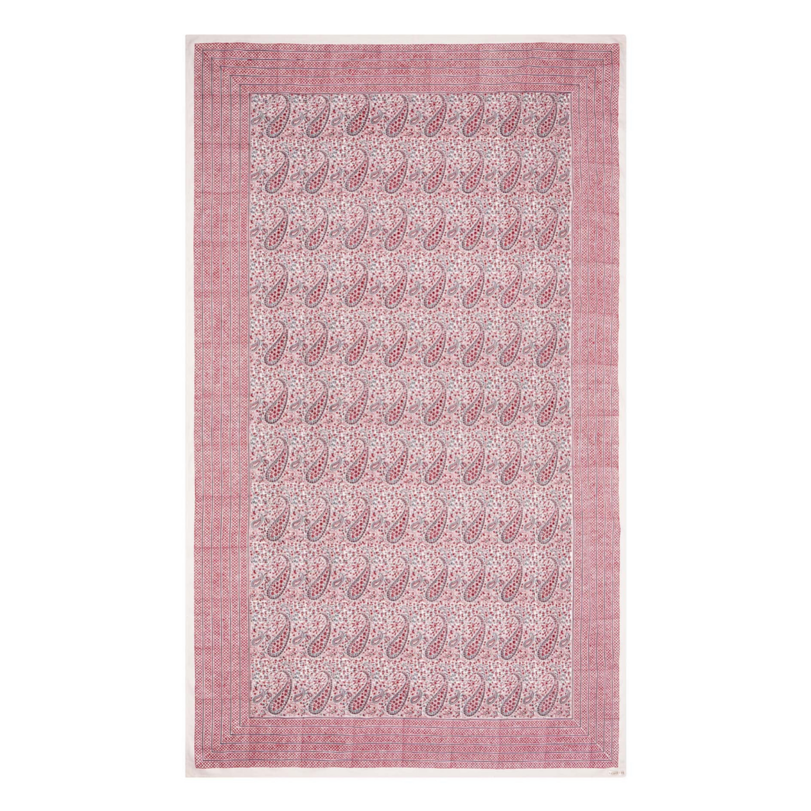 Pink block printed tablecloth with paisley pattern on a white background
