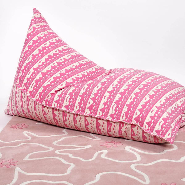 Blush pink hibiscus rug with pink bean bag