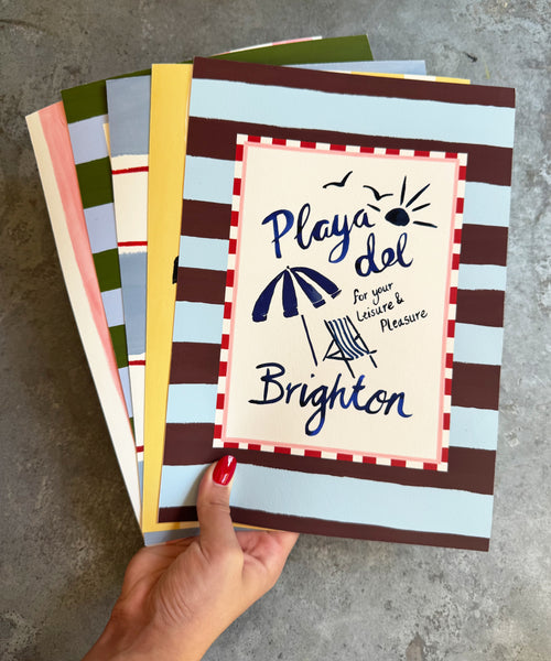 Playa del Brighton - Seaside scene Art Print being held