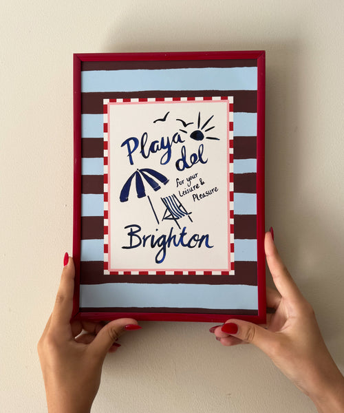 Playa del Brighton - Seaside scene Art Print in frame being held