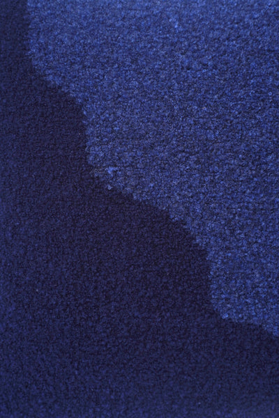 detail of blue/navy knit plush pillowcase in viscose and merino wool