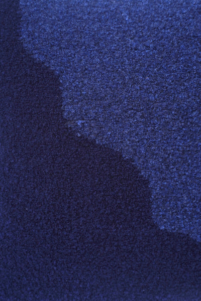 detail of blue/navy knit plush pillowcase in viscose and merino wool