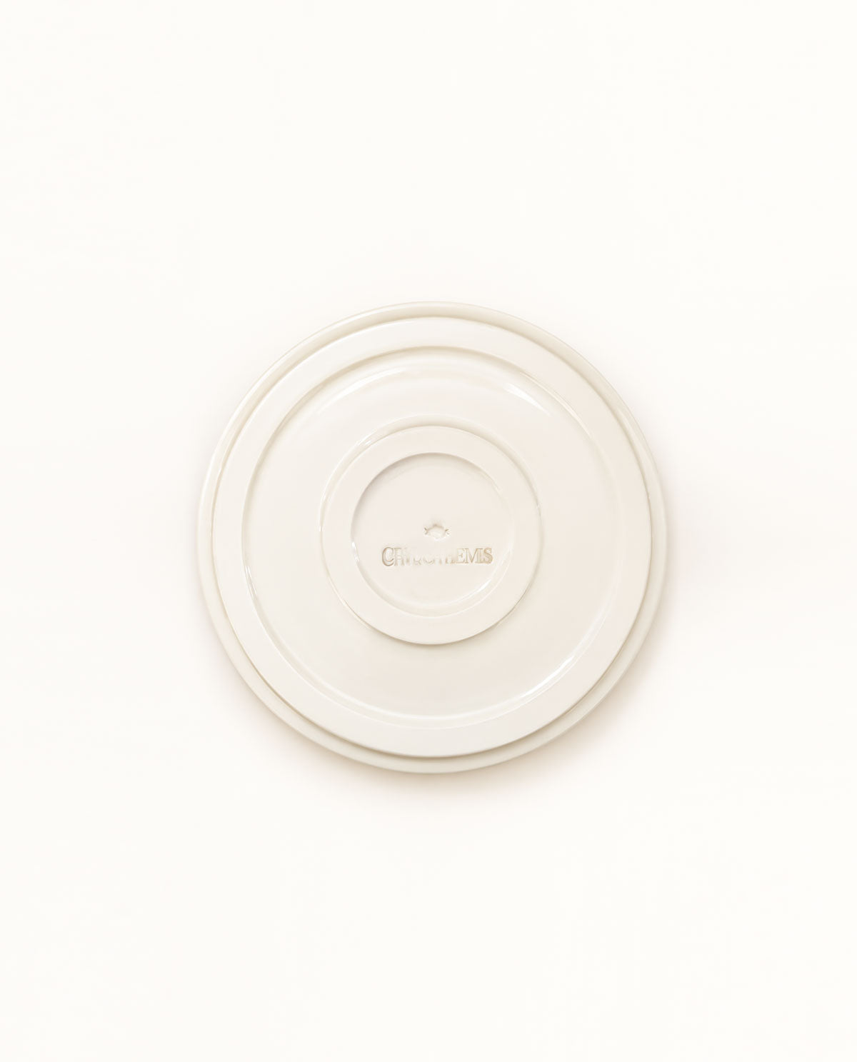 Contemporary handmade ceramic dessert plate featuring expressive burgundy lettering