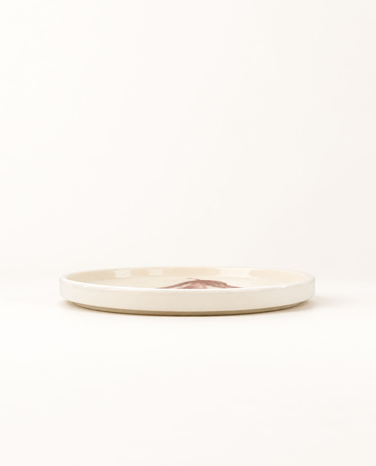 POMONA pear dinner plate with expressive red brushstrokes, handmade in Greece