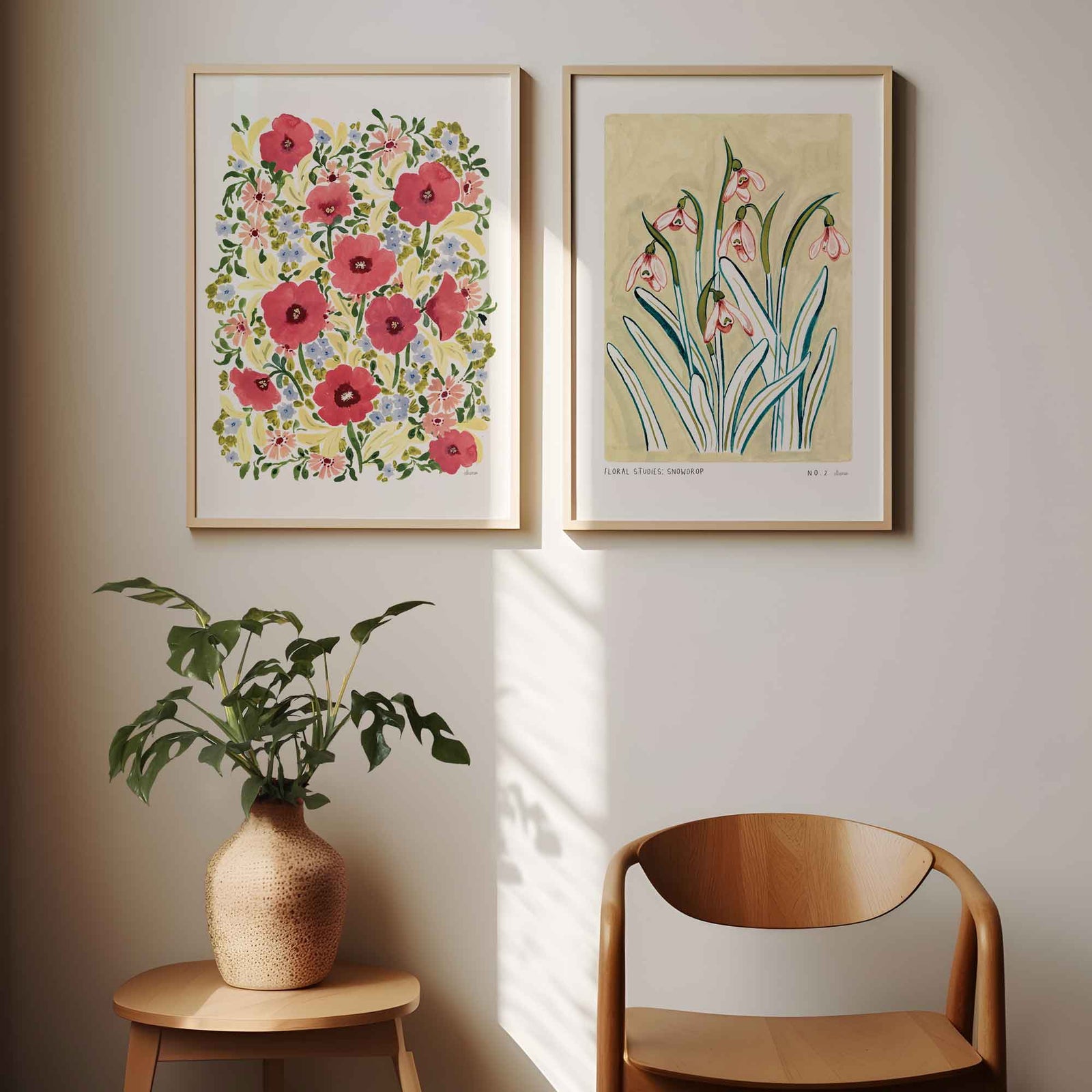 watercolour hand painted poppy floral design, bright pinks, lilacs, butter yellow and greenery fine art print in a2 styled next to our butter yellow snowdrop fine art print